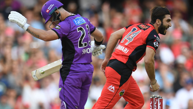 Mohammad Nabi of the Renegades, right, reacts after dismissing the Hurricanes' D'Arcy Short.