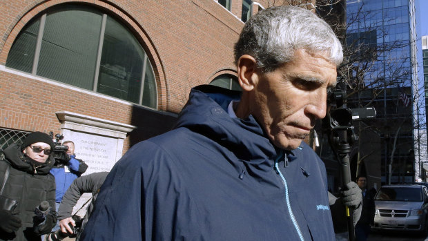 William "Rick" Singer, founder of the Edge College & Career Network, departs federal court in Boston on Tuesday after he pleaded guilty to charges in a nationwide college admissions bribery scandal. 