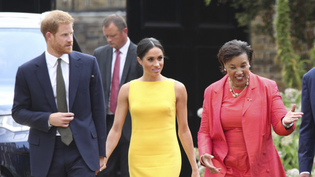 Baroness Scotland with Prince Harry and Meghan Markle. 