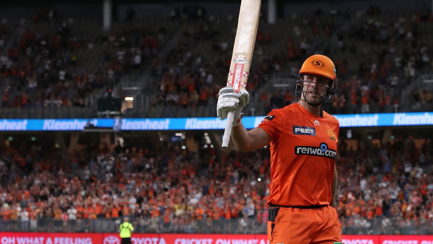 Top notch: Mitchell Marsh of the Scorchers salutes the crowd after scoring 93 not out against Brisbane Heat at Optus Stadium in Perth.