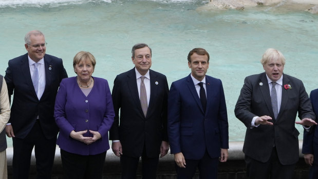 From left, Australian Prime Minister Scott Morrison, German Chancellor Angela Merkel, Italian Prime Minister Mario Draghi, French President Emmanuel Macron and British Prime Minister Boris Johnson.