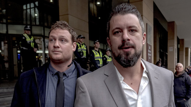 Rick Turner (left) and Neil Erikson leave the Melbourne Magistrates Court on Friday.