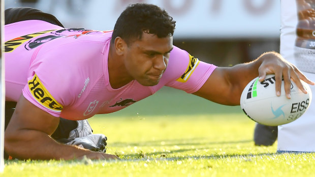 Tevita Pangai jnr scores for Penrith in 2021.