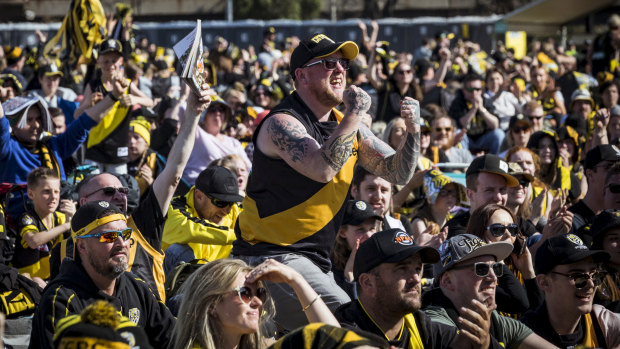 Richmond fan Luke Yendall roars for his beloved Tigers at Punt Road Oval.