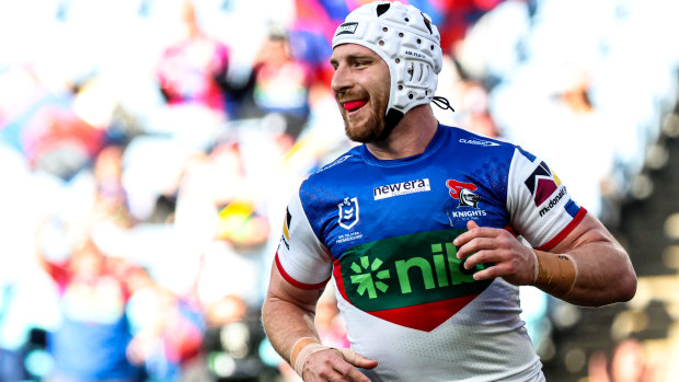 Jackson Hastings celebrates a try for Newcastle.