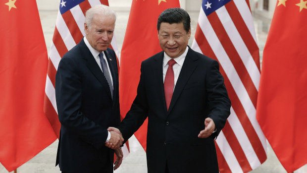 Joe Biden with Xi Jinping, pictured in 2013 when Biden was US vice-president. 