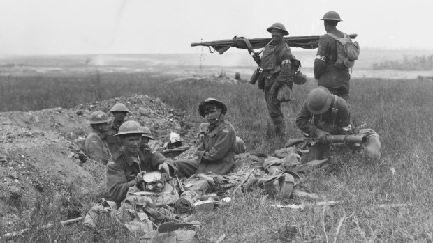 American and Australian stretcher bearers working together in the front line area during the Battle of Hamel.