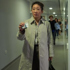 Does a fondness for raincoats make Eve Polastri a good person? Sandra Oh in season one.