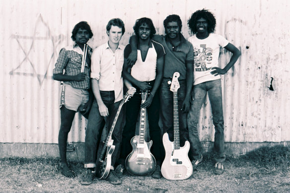 The Warumpi Band in Papunya in 1981, from left, Gordon Butcher, Neil Murray, Sammy Butcher, Denis Minor and George Rrurrambu (deceased).