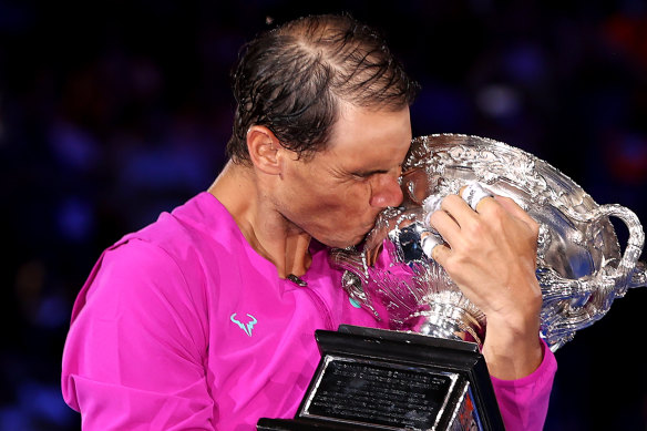 Rafael Nadal kisses the Norman Brookes Challenge Cup.