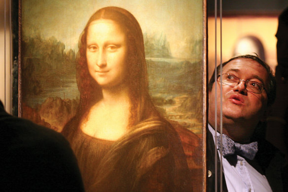 French optical engineer Pascal Cotte with a 360-degree replica of the Mona Lisa.