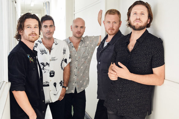 Singer and keyboard player Jon Hart (centre) with his band, Boy and Bear.