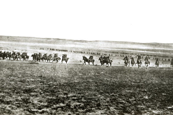 The charge of the 4th Australian Light Horse Brigade at Beersheba.  This photograph was once thought to be of the charge itself, but today is believed to be a reconstruction of the event filmed the next day.