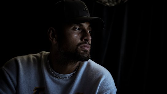 Nick Kyrgios poses for a photo the day after his withdrawal from the Australian Open.