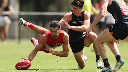 Brodie Grundy and Sam Taylor compete for the ball in a pre-season clash.