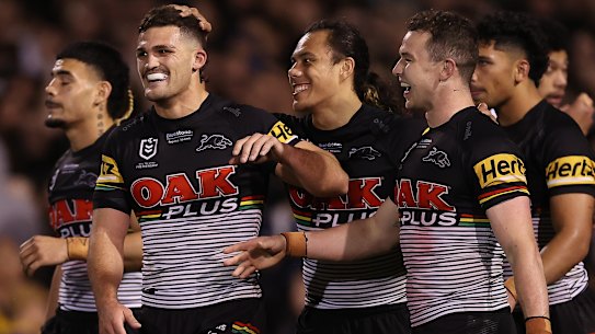 Nathan Cleary and Dylan Edwards celebrate a Panthers try.