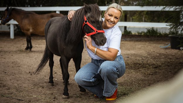 Sarah Hayden and pony Teddy, one of her equine-assisted psychotherapy animals for her work treating neurodivergent young people.
