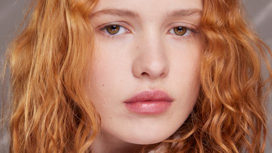 Using a smoothing hair mask after showering and before styling can help lock in moisture. 