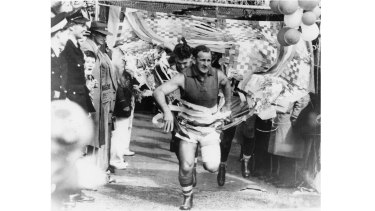 Footscrayâ€™s captain Charlie Sutton leads the team out.
