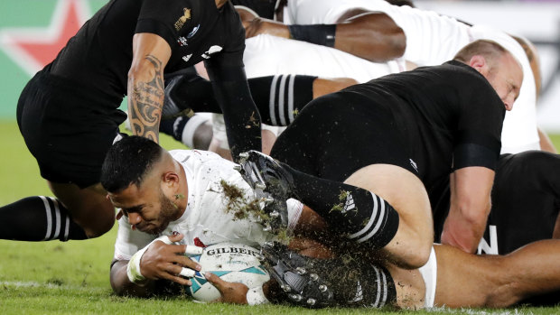 Unstoppable: Manu Tuilagi crashes over early to gain an ascendancy England never relinquished.