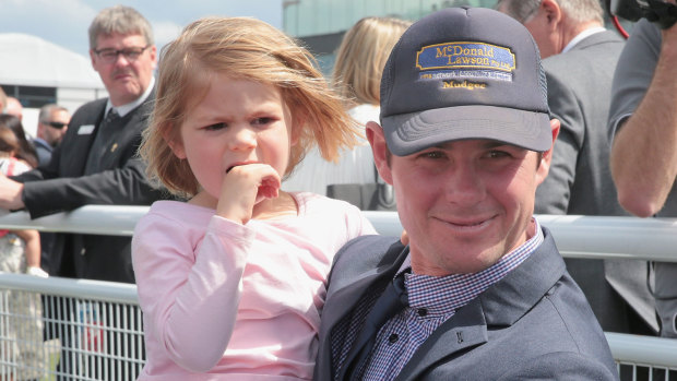 Trainer Clint Lundholm, with daughter Allie, has taken the blinkers off lightly raced Great Southernland.