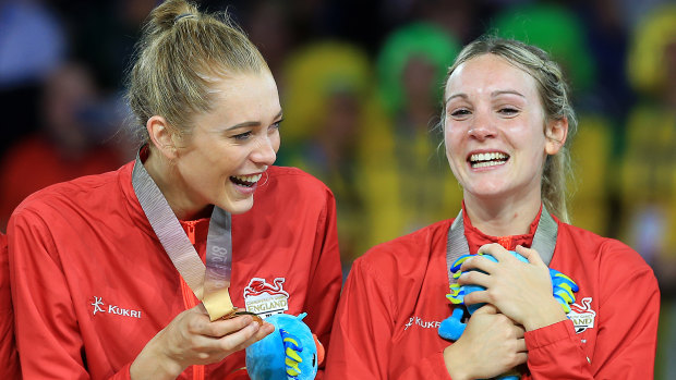 Golden girls: Helen Housby (left) and Natalie Haythornthwaite celebrate England's gold medal at the Commonwealth Games.