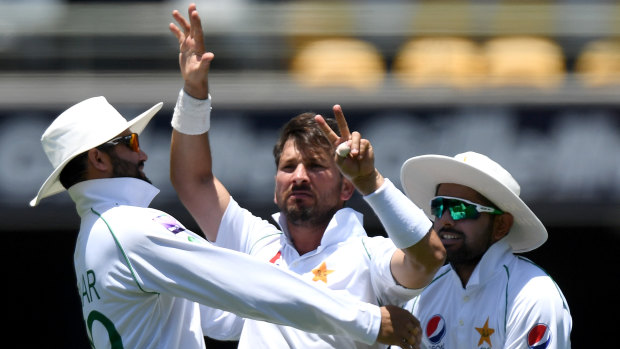 Bragging rights: Yasir Shah celebrates taking the wicket of Steve Smith.