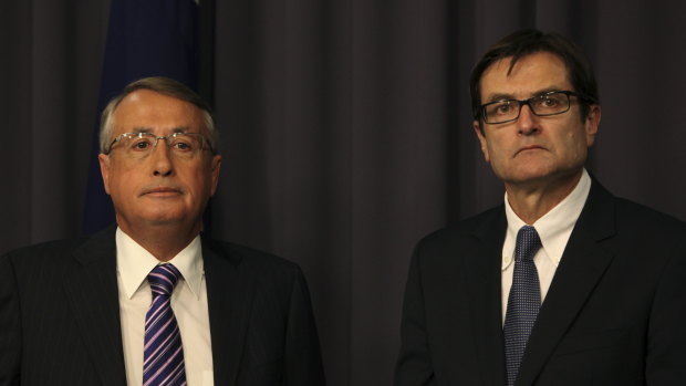 Party president Wayne Swan with reviewer Greg Combet, pictured as Labor ministers in 2012.