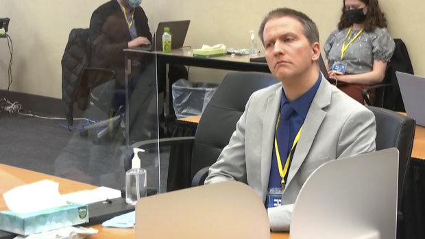 Former Minneapolis police officer Derek Chauvin listens as his defence attorney Eric Nelson gives closing arguments in his murder trial.