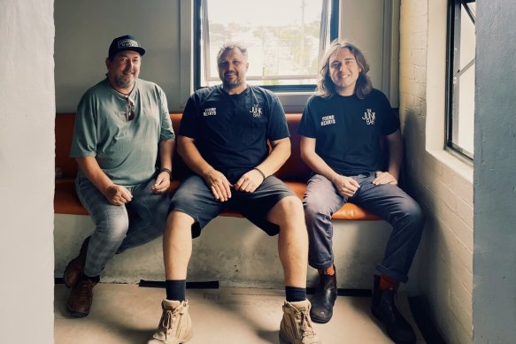 (Left to right) The Junk Bar sound engineer Shunya, co-owner Dylan Proctor and booking manager Fraser Bell at their soon-to-be new home on Brunswick Street in New Farm. 