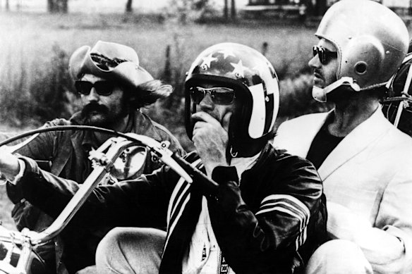 Dennis Hopper (left) with Peter Fonda and Jack Nicholson in the1969 film Easy Rider.