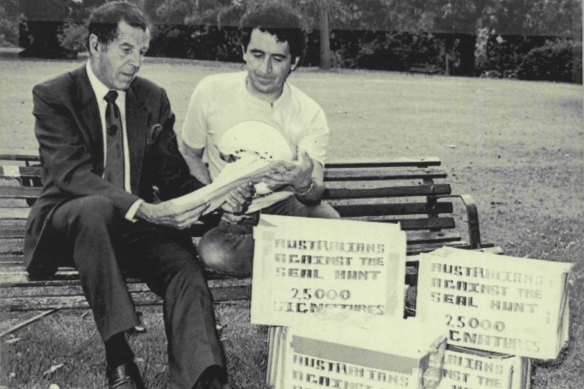Senator Don Chipp and Democrat candidate Richard Jones with a petition against Canada hunting seals in 1984.