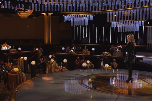 Amy Poehler hosting the 2021 Golden Globes from the ballroom at the Beverly Hilton in Los Angeles.