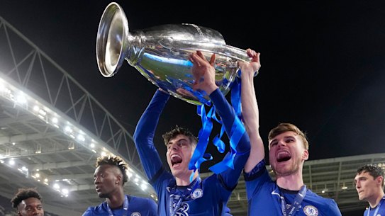 Kai Havertz and Timo Werner of Chelsea celebrate with the Champions League Trophy following their team’s victory last season.