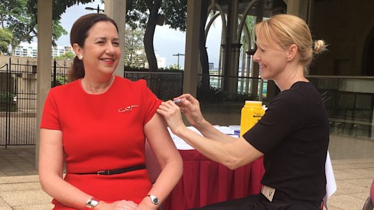 Queensland Premier Annastacia Palaszczuk gets a flu shot on Tuesday