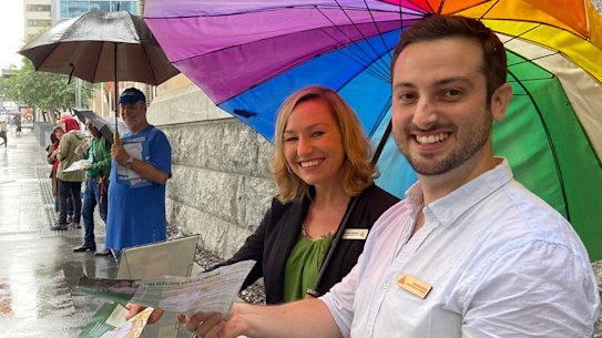 Greens Senator Larissa Waters with Brisbane candidate Stephen Bates during pre-poll voting at Brisbane City Hall last week.
