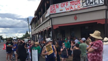 Protestors move to line the main streets of Clermont as the Stop Adani convoy arrives in early May.