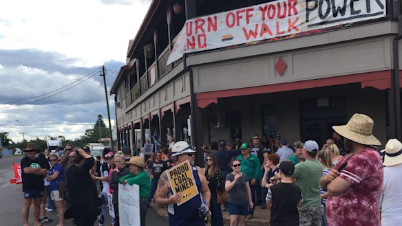 Protestors move to line the main streets of Clermont as the Stop Adani convoy arrives in early May.