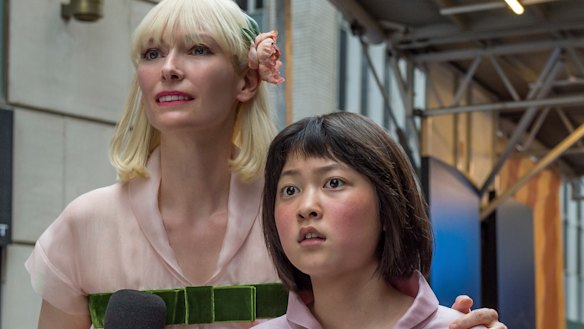 Tilda Swinton (left) with An Seo Hyun in the film Okja.