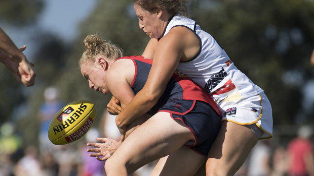 Emma Humphries, pictured here in action for the Demons, now has a slightly longer trip to make it to training.