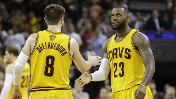 Former Cleveland Cavaliers teammates Matthew Dellavedova and LeBron James.