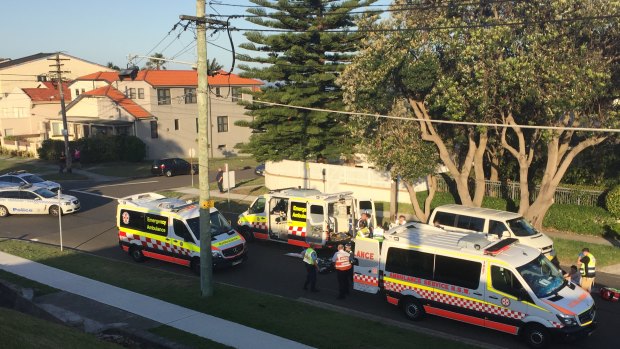 Ambulances at the scene of the collision on Military Road, Dover Heights. 