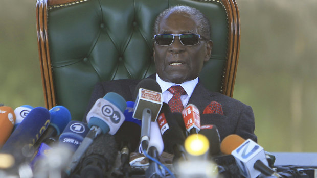 Former Zimbabwean President Robert Mugabe holds a press briefing on the eve of the country's elections. 