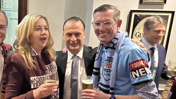 Queensland Premier Anastasia Palaschuk  and NSW Premier 
Dominic Perrottet walked down Caxton Street with Peter V’landys (centre) and Andrew Abdo before the game.