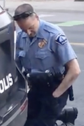 Police officer Derek Chauvin kneels on George Floyd, who is out of frame.