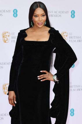 Super model Naomi Campbell in Burberry.