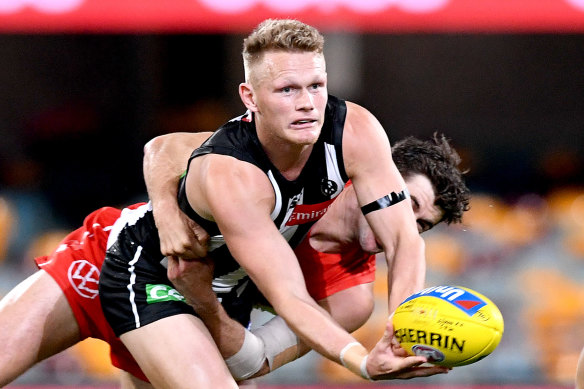 Adam Treloar's partner has signed with the Queensland Firebirds. 