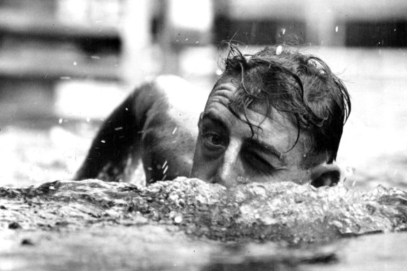 Frank O’Neill races towards the camera in a training workout, 1951.
