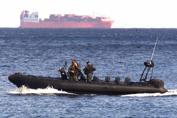 An Australian Army vessel patrols the waters near the Norwegian freighter Tampa in 2001. 