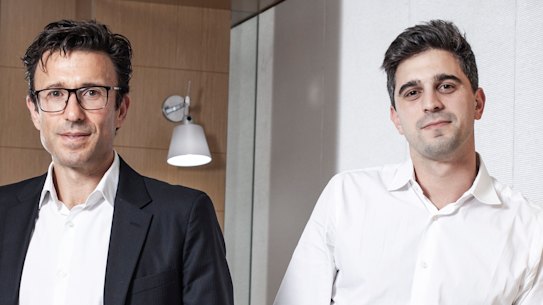 Afterpay founders Anthony Eisen and Nick Molnar watch as competitors scramble for minor placings.